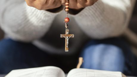 religious-woman-praying-with-rosary-beads-1200×1200